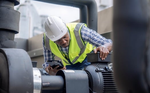 put humans in my image that shows Unapproved electrical equipment poses serious risks in the workplace, including electrical shock and fire hazards